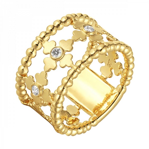 Wide gold band ring with floral cutout design and small diamonds.