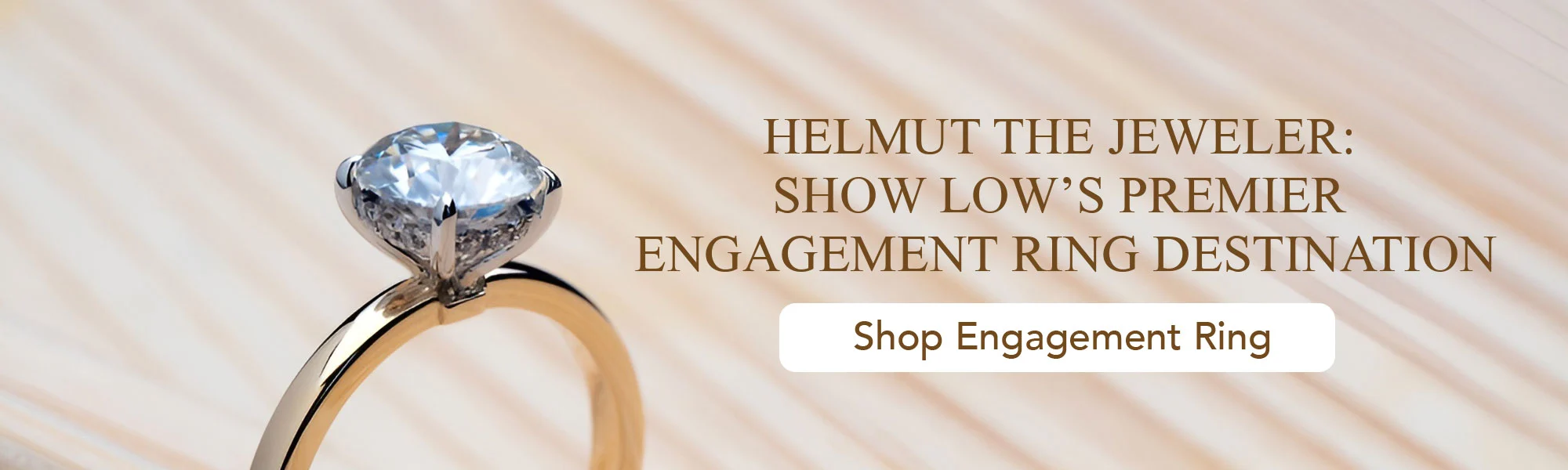 Close-up diamond solitaire engagement ring banner for HELMUT the Jeweler
